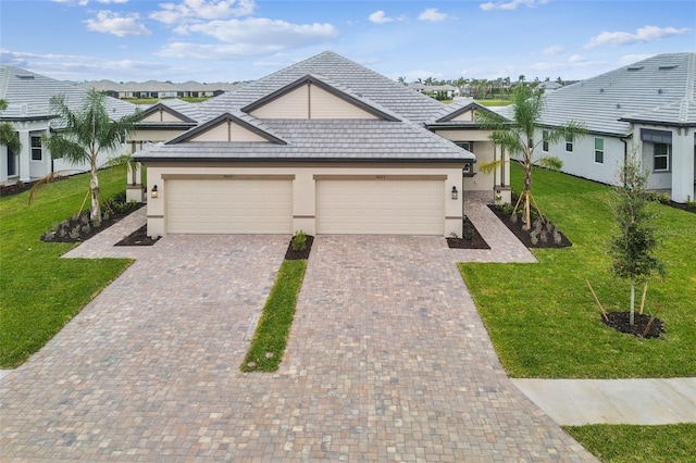 single story home with a front yard and a garage