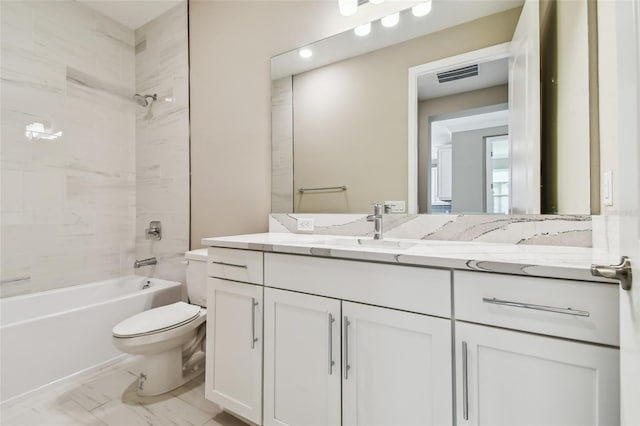 full bathroom with vanity, shower / bath combination, and toilet