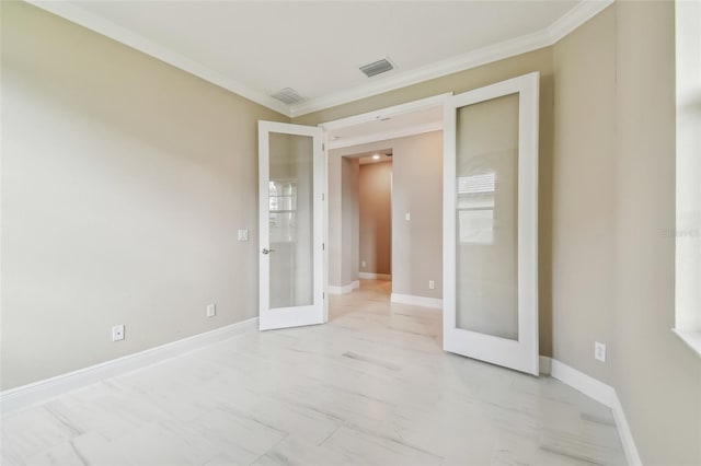 unfurnished room featuring french doors and ornamental molding