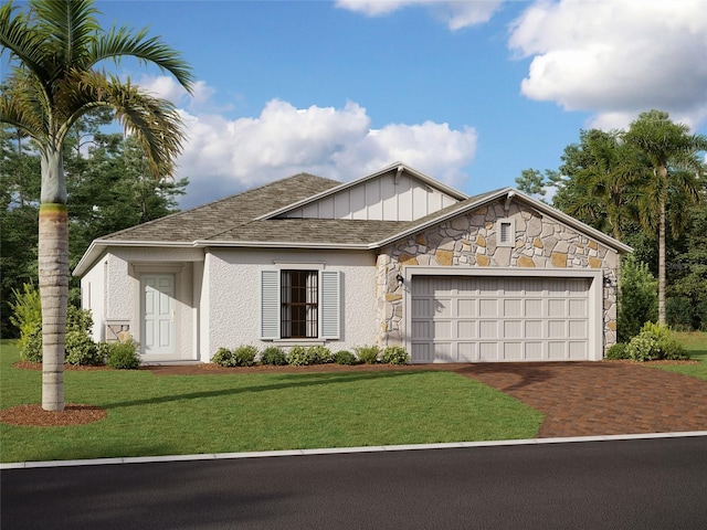 view of front facade with a garage and a front yard