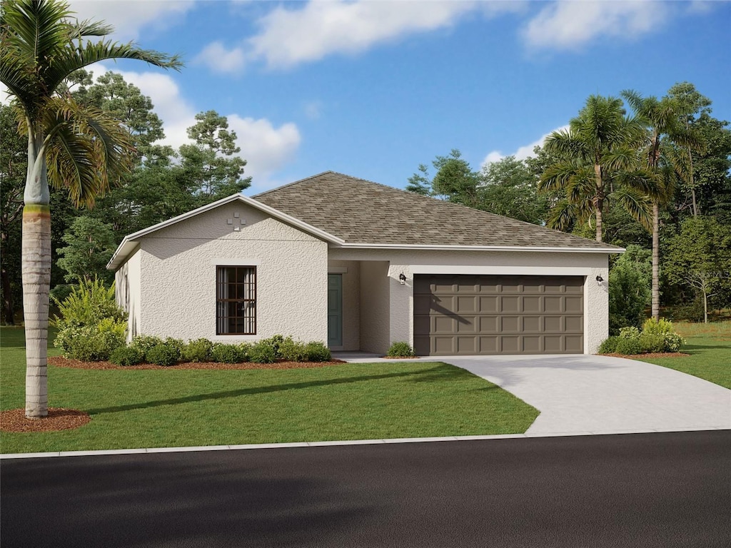 view of front of house with a garage and a front lawn