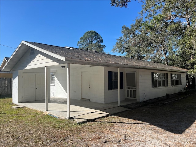 rear view of house featuring a patio