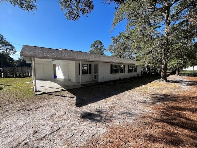 rear view of house with a patio area