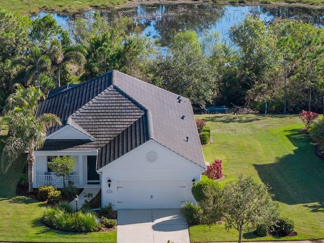 drone / aerial view featuring a water view