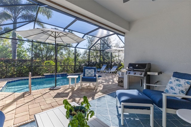 view of swimming pool featuring a patio, glass enclosure, and grilling area