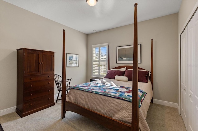 carpeted bedroom with a closet