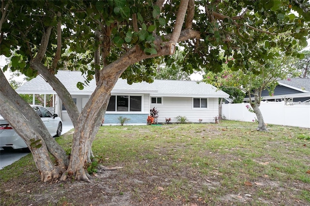 ranch-style house with a front yard