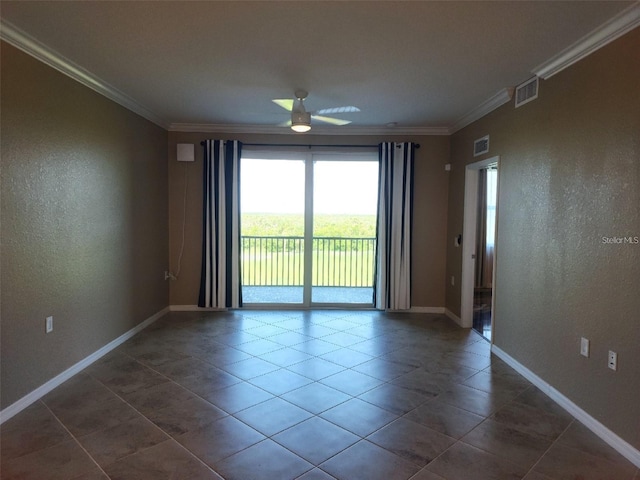 tiled empty room featuring ceiling fan and crown molding