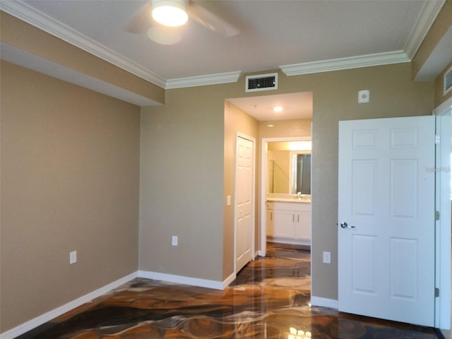 unfurnished room with ceiling fan and ornamental molding