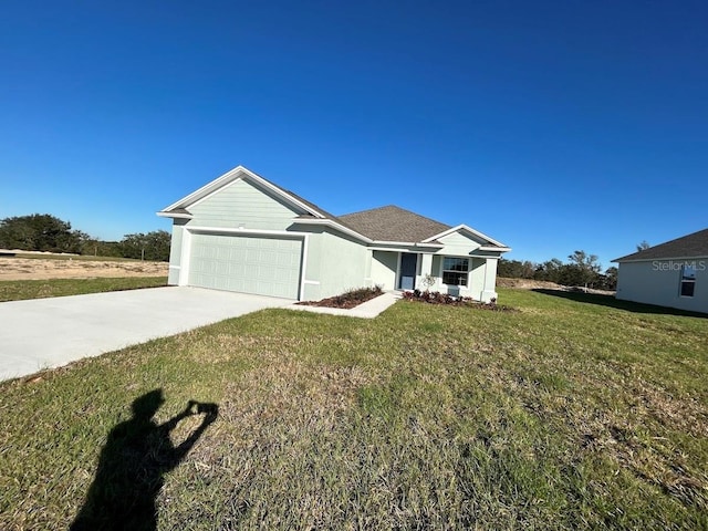 ranch-style house with a front lawn and a garage