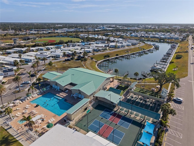 bird's eye view with a water view