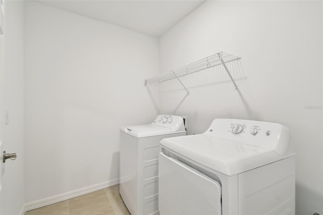 laundry area featuring independent washer and dryer