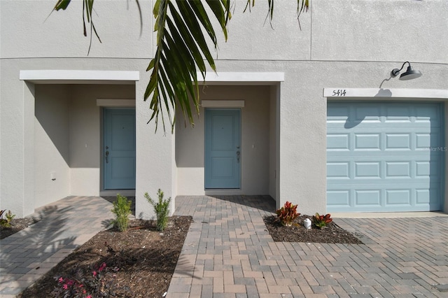 property entrance featuring a garage