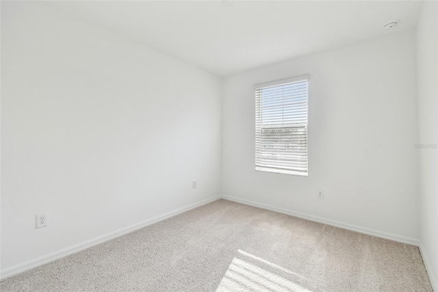 spare room with carpet flooring