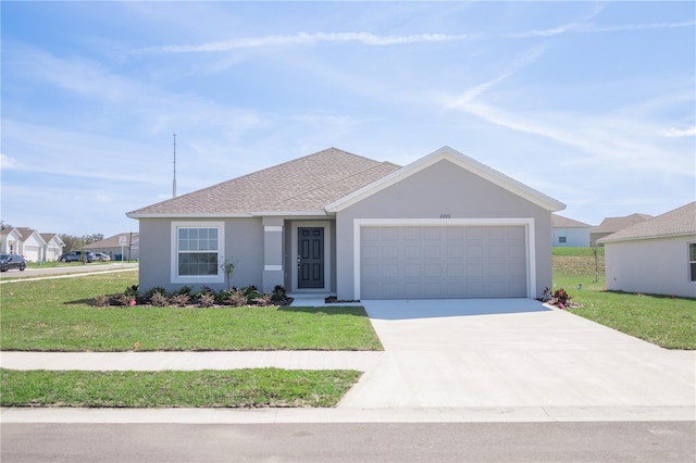 2203 Carson Loop, Lake Wales, FL 33859 - ranch-style home featuring roof with shingles, a front lawn, driveway, an attached garage, and stucco siding