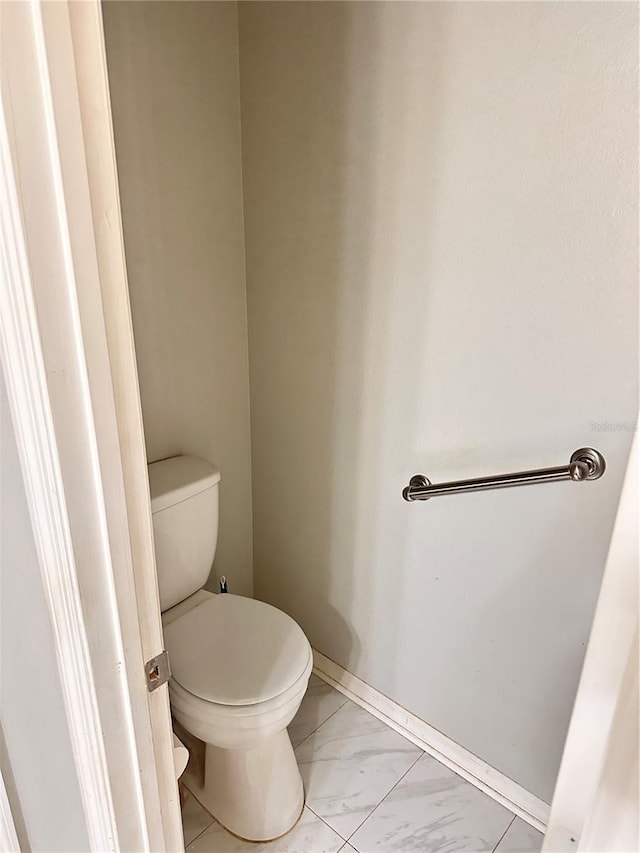 bathroom featuring toilet