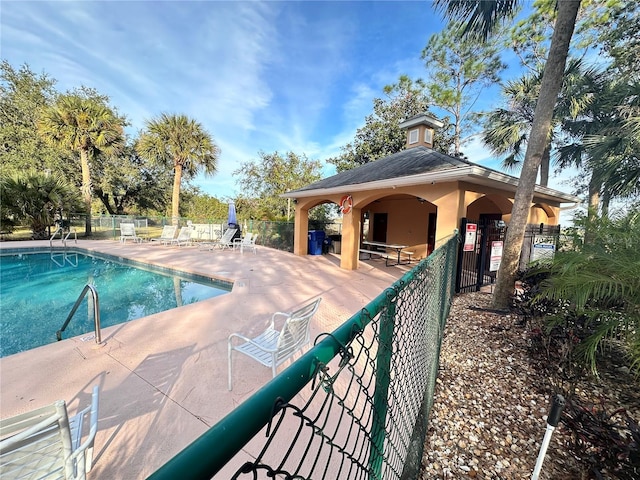 view of pool featuring a patio area