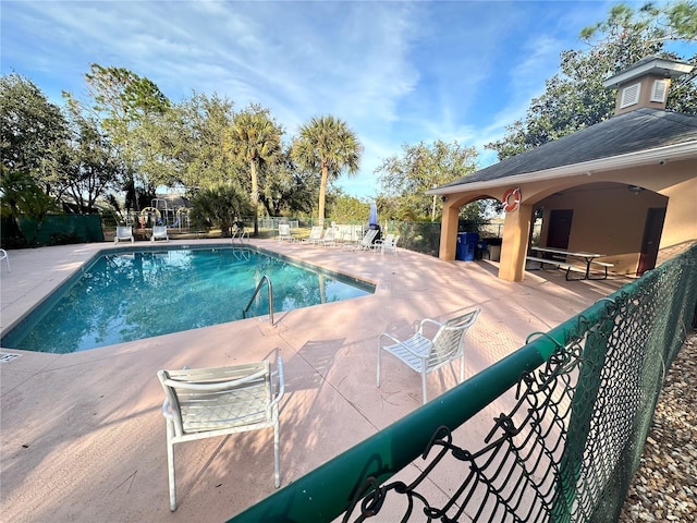 view of pool with a patio