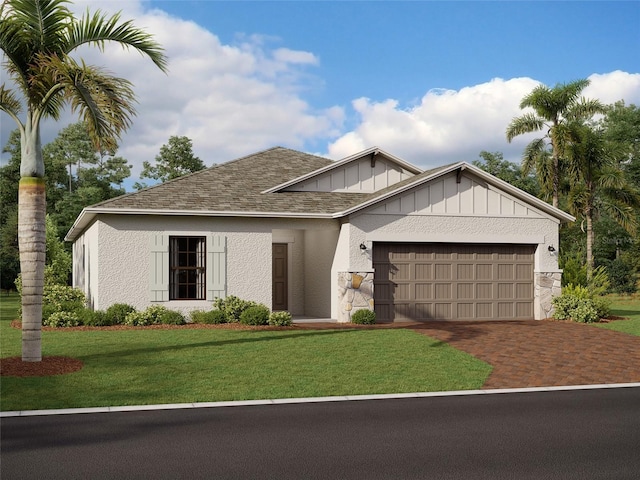 view of front facade featuring a front yard and a garage