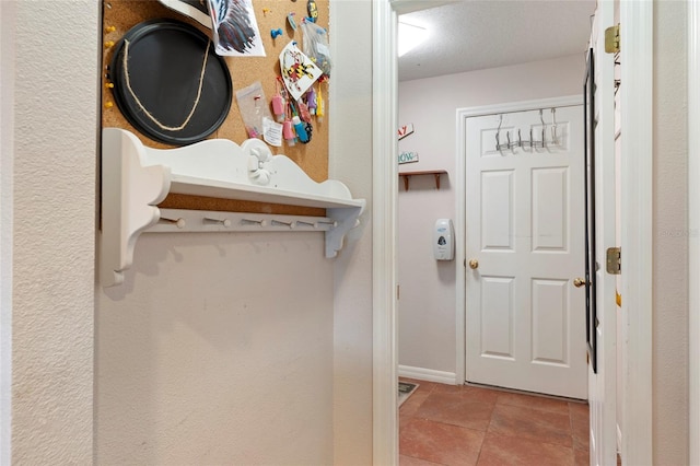 bathroom with a textured ceiling