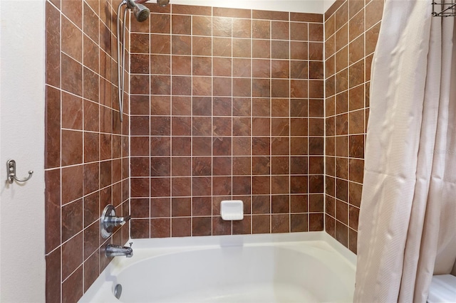 bathroom featuring shower / tub combo with curtain