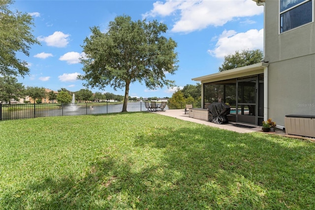 view of yard with a patio area and a sunroom