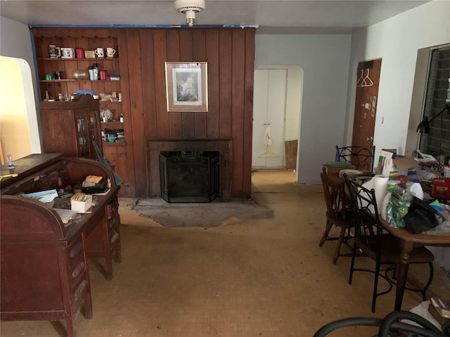 living room with wooden walls