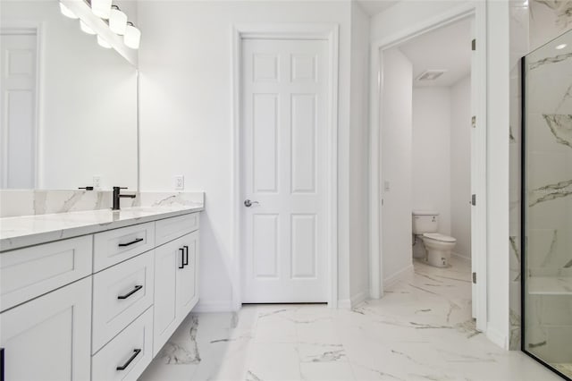 bathroom with walk in shower, vanity, and toilet