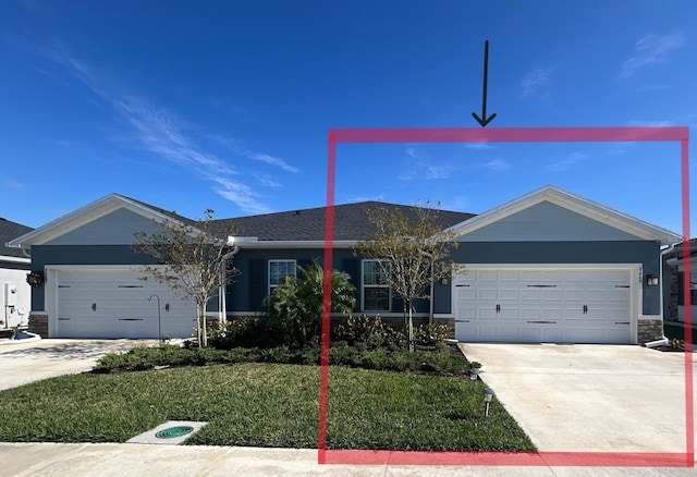 ranch-style house with a front yard and a garage