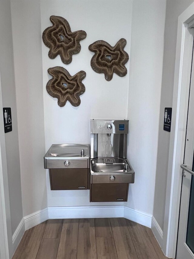 interior details with hardwood / wood-style flooring