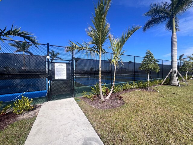 exterior space featuring tennis court