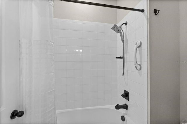 bathroom featuring shower / bath combo with shower curtain