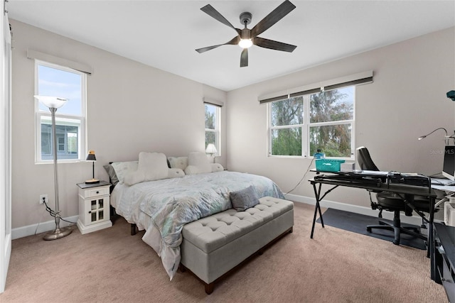 bedroom featuring ceiling fan and carpet floors