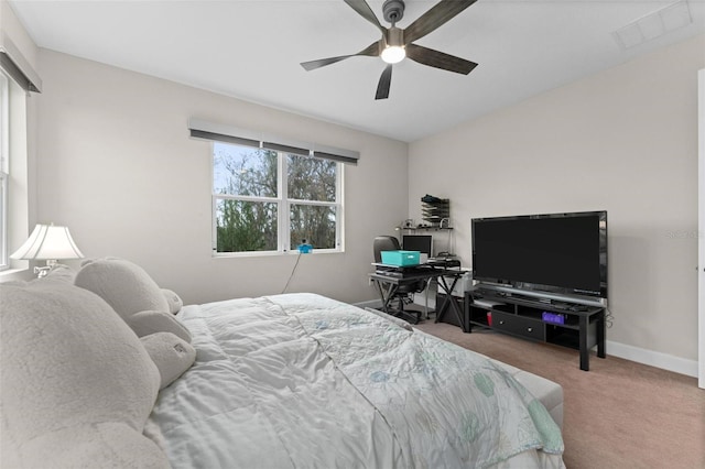 bedroom with ceiling fan and carpet floors