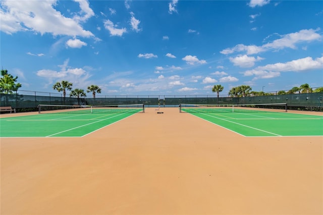 view of tennis court featuring basketball court