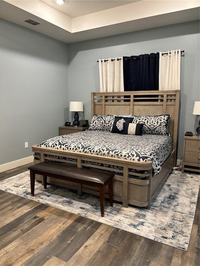 bedroom featuring wood-type flooring