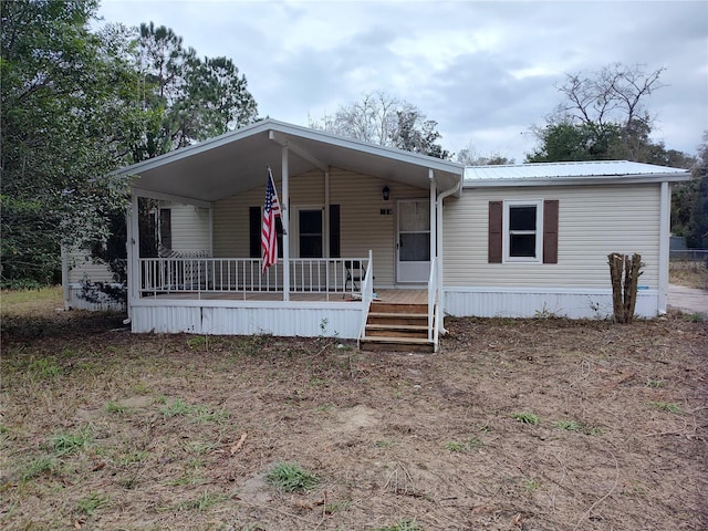 manufactured / mobile home with a porch