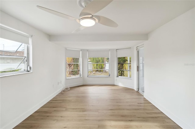 unfurnished room with light hardwood / wood-style floors and ceiling fan