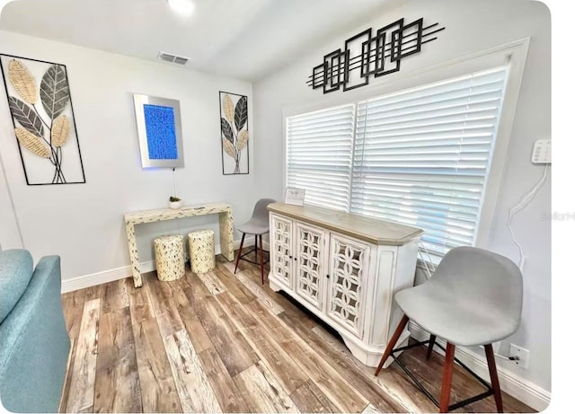 living area featuring hardwood / wood-style floors