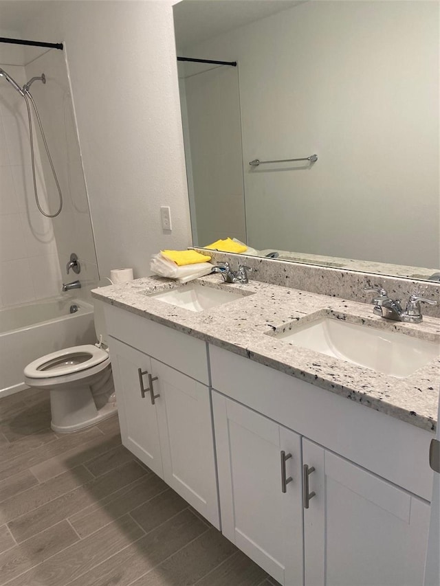 full bathroom with vanity, toilet, and shower / bathing tub combination