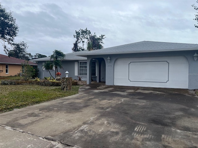 single story home with a garage