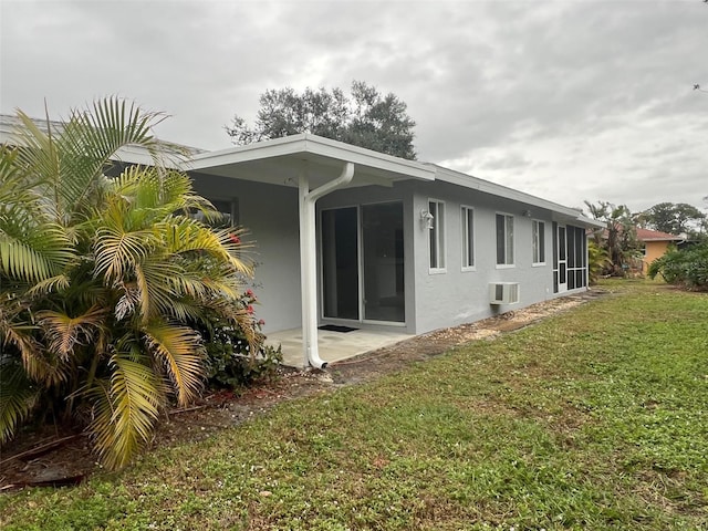 view of home's exterior with a yard