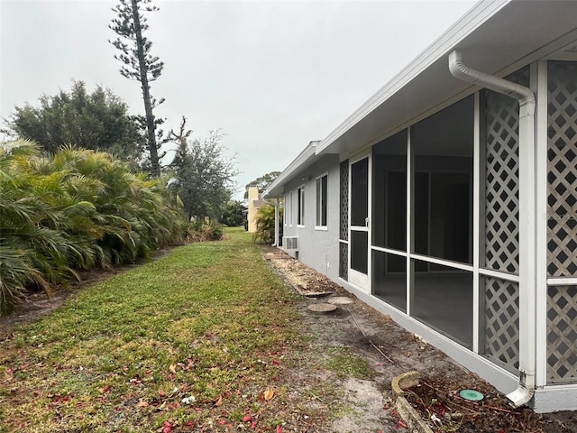 view of yard with a sunroom