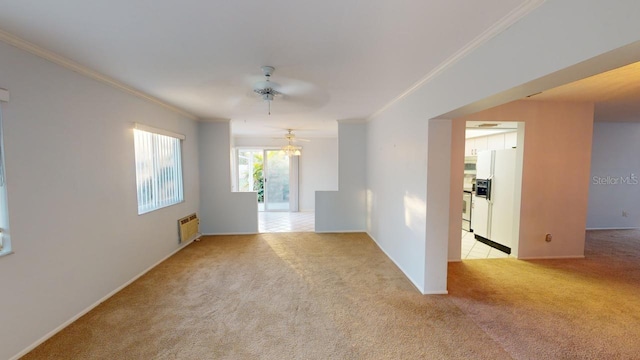 carpeted empty room with ceiling fan, ornamental molding, and heating unit