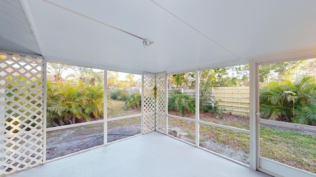 unfurnished sunroom with a wealth of natural light