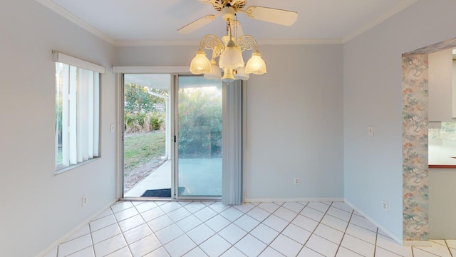 unfurnished dining area featuring crown molding, ceiling fan, and light tile patterned flooring