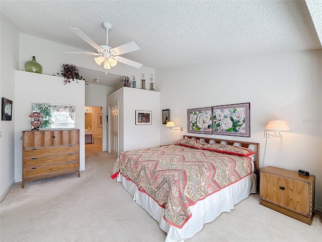 carpeted bedroom with ceiling fan, vaulted ceiling, and a textured ceiling