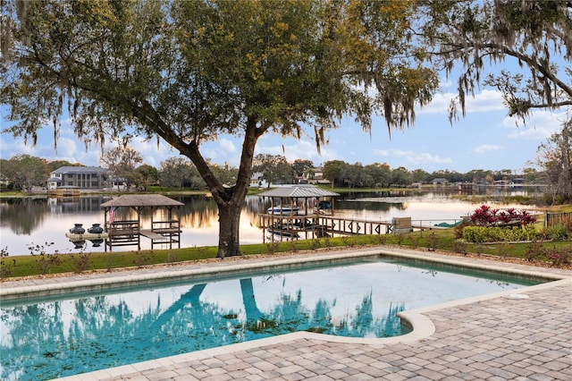 view of pool featuring a gazebo and a water view