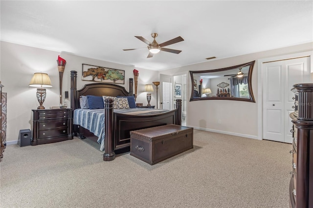 bedroom with carpet floors, ceiling fan, and a closet