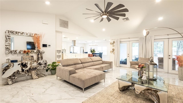 living room with ceiling fan, high vaulted ceiling, and french doors